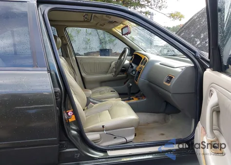 1999 Infiniti G20 Standard/Touring z USA, uszkodzony, nr VIN JNKCP11A9XT002407